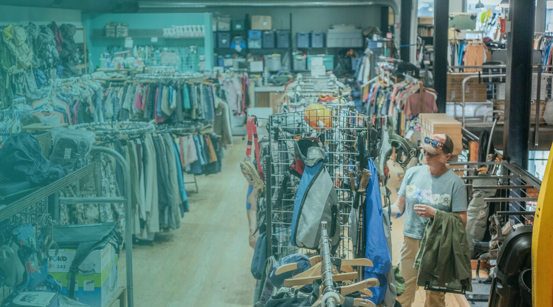customer shopping used outdoor gear in Grand Junction