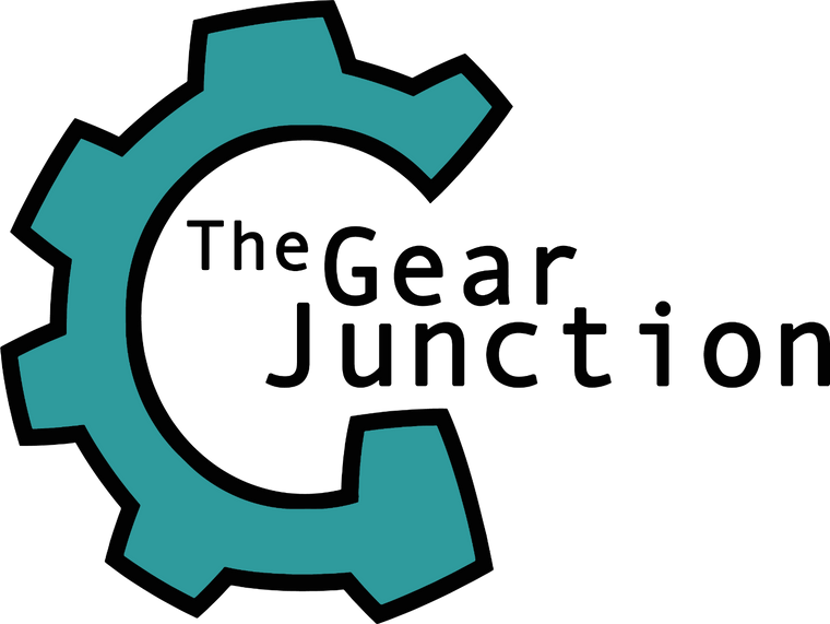 Logo of 'The Gear Junction' with a teal gear on a white background